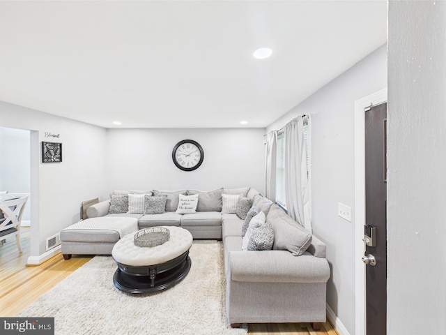 8663 Black Oak, Baltimore, MD 21234 - living room featuring wood finished floors, recessed lighting, and baseboards