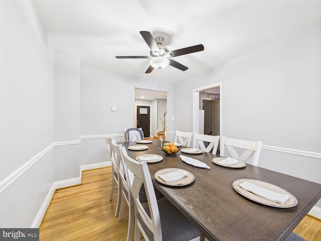 8663 Black Oak, Baltimore, MD 21234 - dining space featuring light wood-type flooring, ceiling fan, and baseboards