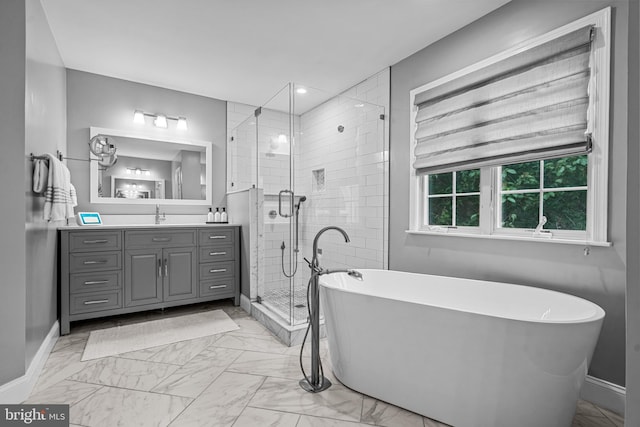115 Hartefeld Dr, Avondale, PA 19311 - full bathroom with vanity, a stall shower, marble finish floors, and a freestanding bath
