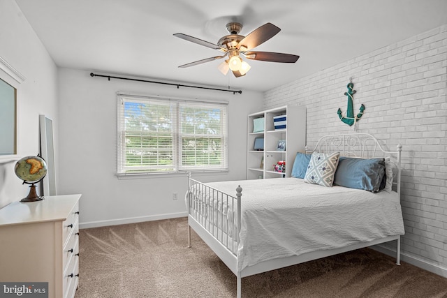 115 Hartefeld Dr, Avondale, PA 19311 - bedroom featuring brick wall, carpet, baseboards, and a ceiling fan