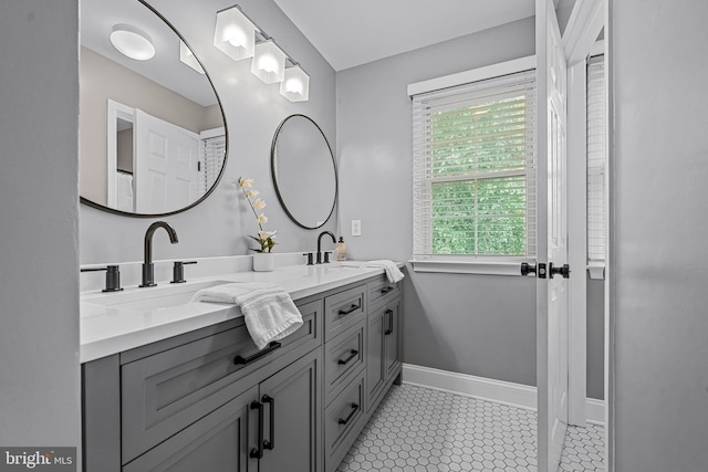 115 Hartefeld Dr, Avondale, PA 19311 - full bathroom featuring baseboards and double vanity