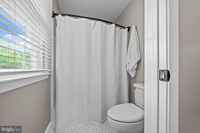 115 Hartefeld Dr, Avondale, PA 19311 - bathroom with tile patterned flooring, toilet, and curtained shower