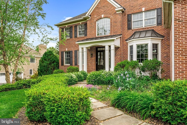 115 Hartefeld Dr, Avondale, PA 19311 - colonial home featuring brick siding