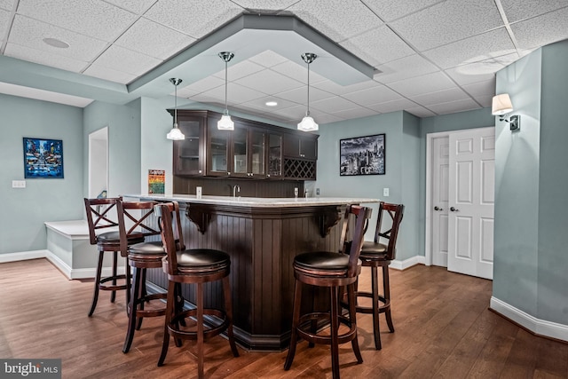 115 Hartefeld Dr, Avondale, PA 19311 - indoor wet bar with baseboards, dark wood-type flooring, a drop ceiling, and pendant lighting