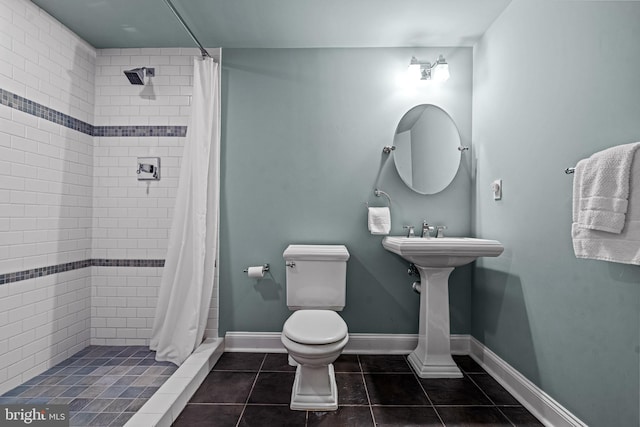 115 Hartefeld Dr, Avondale, PA 19311 - full bath with toilet, a tile shower, tile patterned floors, and baseboards