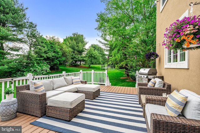 115 Hartefeld Dr, Avondale, PA 19311 - wooden deck with outdoor lounge area, a grill, a lawn, and view of scattered trees