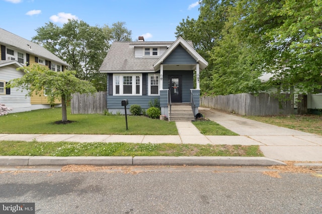 294 Jefferson St, Carneys Point, NJ 08069 - bungalow with a shingled roof, a chimney, and driveway