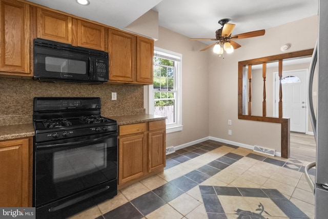 294 Jefferson St, Carneys Point, NJ 08069 - kitchen with black appliances, tasteful backsplash, a ceiling fan, brown cabinetry, and tile patterned floors
