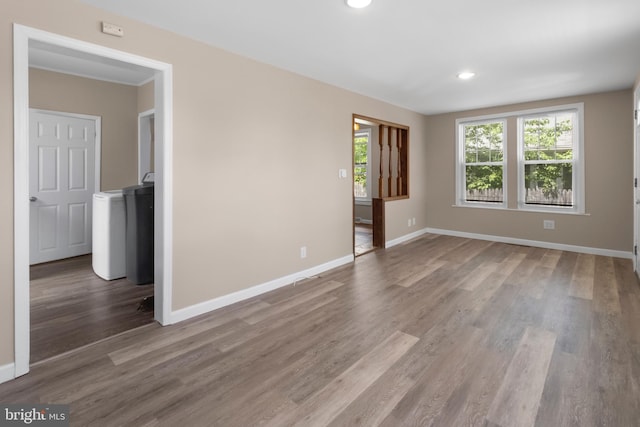294 Jefferson St, Carneys Point, NJ 08069 - spare room featuring washer / dryer, wood finished floors, baseboards, and recessed lighting