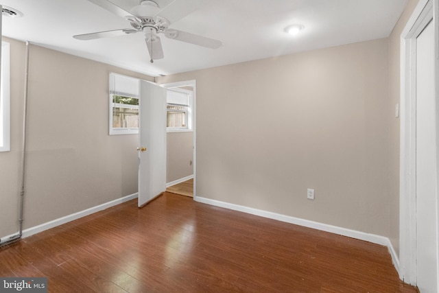 294 Jefferson St, Carneys Point, NJ 08069 - unfurnished bedroom with baseboards, wood finished floors, and ceiling fan