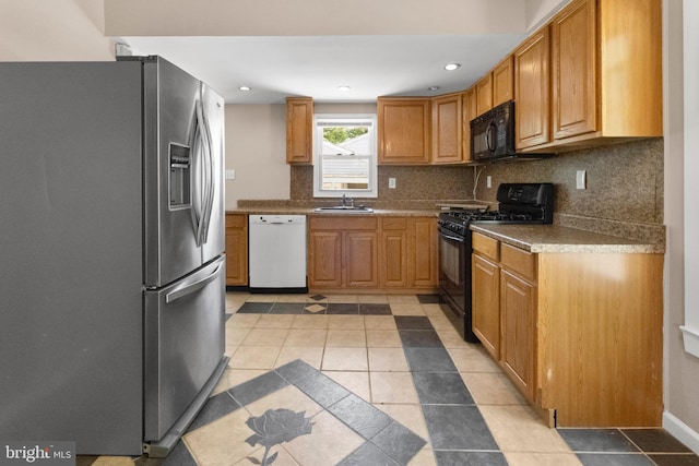 294 Jefferson St, Carneys Point, NJ 08069 - kitchen with black appliances, a sink, backsplash, recessed lighting, and light tile patterned floors