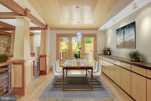 618 20th St S, Arlington, VA 22202 - dining area featuring light wood-style flooring and ornate columns