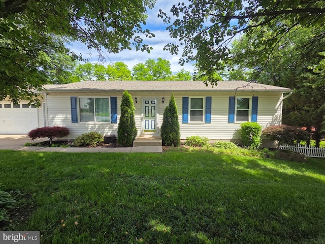 101 George St, Taneytown, MD 21787 - ranch-style home featuring a garage and a front lawn