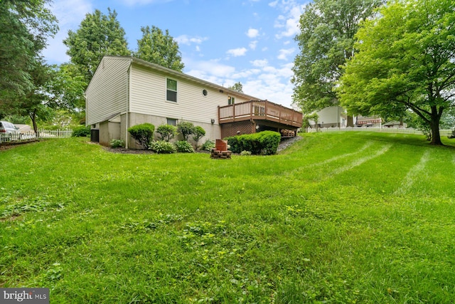 101 George St, Taneytown, MD 21787 - back of property with a wooden deck and central AC