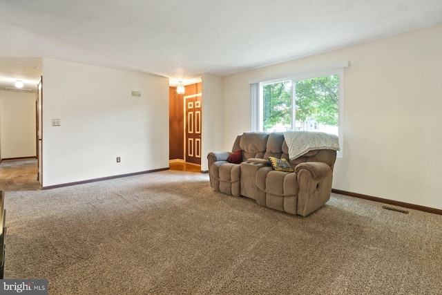 101 George St, Taneytown, MD 21787 - carpeted living room featuring baseboards