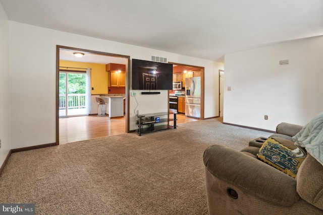101 George St, Taneytown, MD 21787 - living area featuring light colored carpet and baseboards
