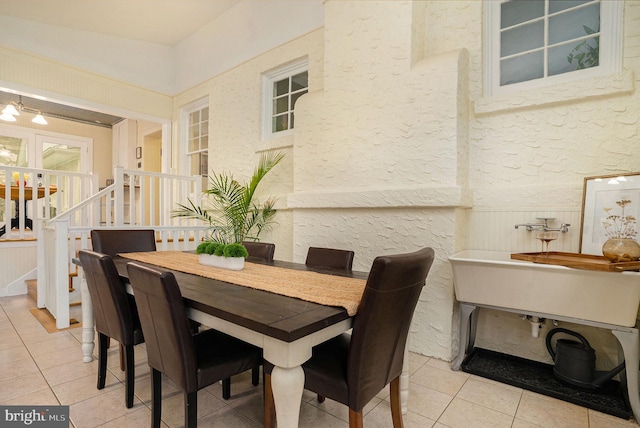 759 Avenue F, Langhorne, PA 19047 - dining space featuring light tile patterned flooring, wainscoting, and a textured wall