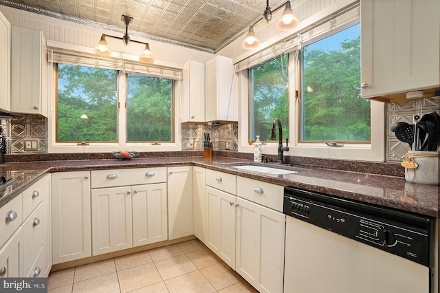 759 Avenue F, Langhorne, PA 19047 - kitchen featuring dishwasher, a sink, an ornate ceiling, light tile patterned floors, and dark stone countertops