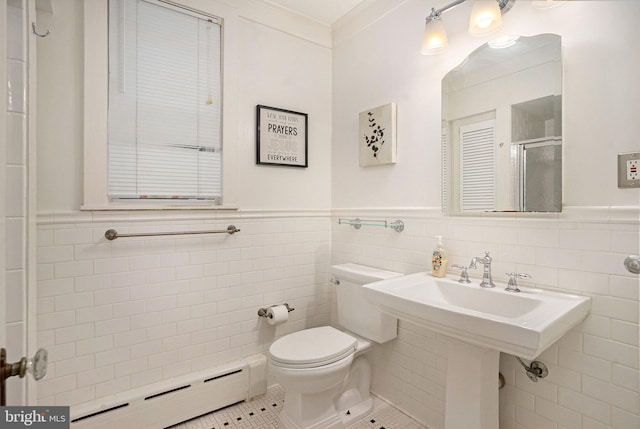 759 Avenue F, Langhorne, PA 19047 - full bathroom with baseboard heating, tile walls, tile patterned flooring, wainscoting, and toilet