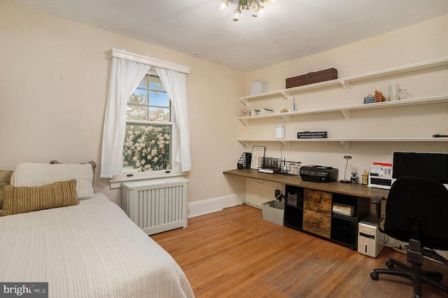 759 Avenue F, Langhorne, PA 19047 - bedroom featuring radiator, a desk, light wood-style flooring, and baseboards