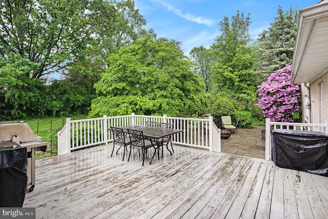 759 Avenue F, Langhorne, PA 19047 - wooden deck featuring outdoor dining space and view of scattered trees