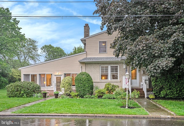 759 Avenue F, Langhorne, PA 19047 - view of front of property featuring a chimney and a front yard