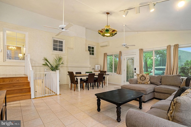 759 Avenue F, Langhorne, PA 19047 - living room with ceiling fan, an AC wall unit, track lighting, healthy amount of natural light, and high vaulted ceiling