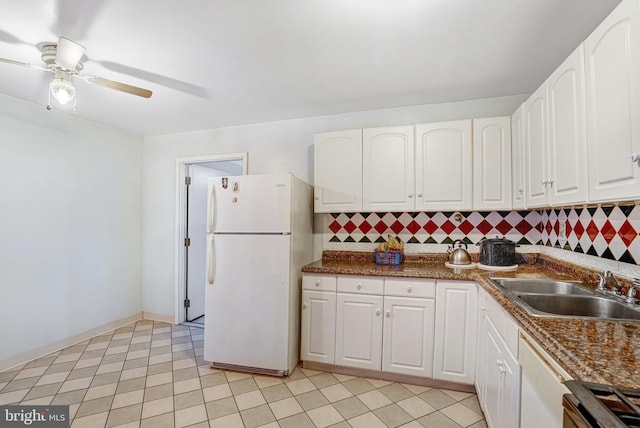 102 S Glebe Rd S, Arlington, VA 22204 - kitchen featuring white appliances, a sink, tasteful backsplash, and white cabinets