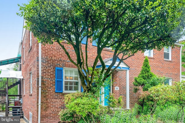 102 S Glebe Rd S, Arlington, VA 22204 - view of home's exterior with brick siding and stairs