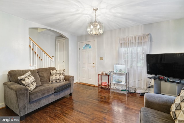 102 S Glebe Rd S, Arlington, VA 22204 - living room with arched walkways, wood finished floors, stairway, and a chandelier