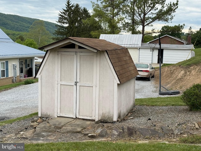 64 Mulberry St, Franklin, WV 26807 - view of shed with a mountain view