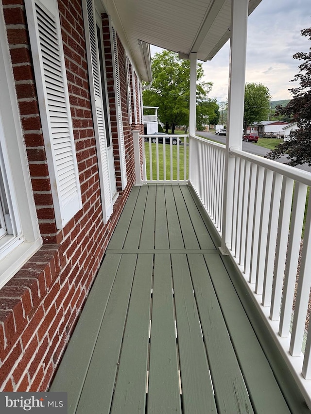 64 Mulberry St, Franklin, WV 26807 - wooden deck featuring covered porch