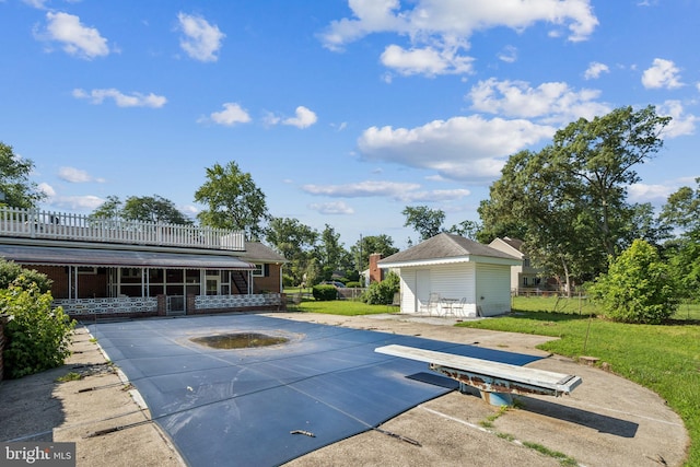 931 Oakdale Cir, Millersville, MD 21108 - view of pool with a sunroom, a diving board, a patio, and an outdoor structure