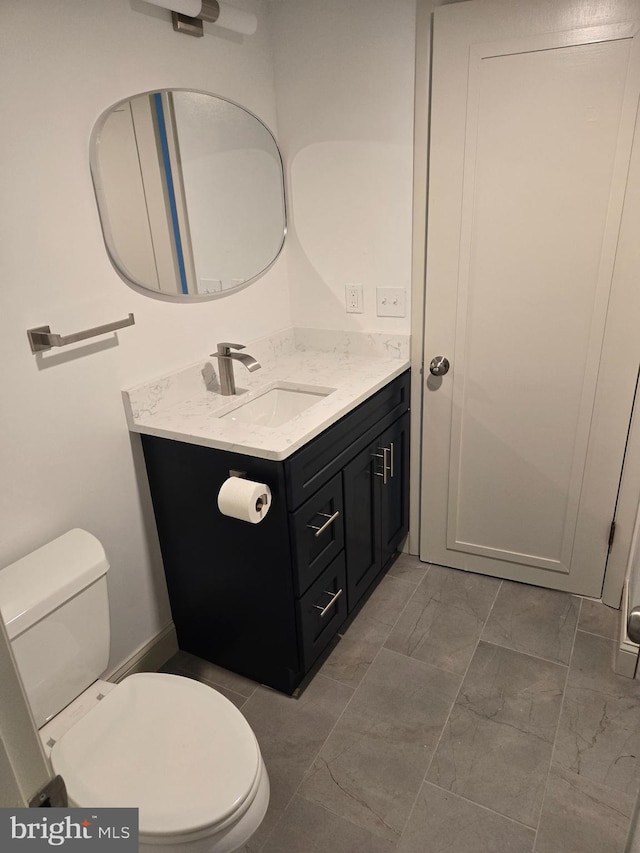 6 Granby Ln, Ocean Pines, MD 21811 - bathroom with vanity, toilet, and marble finish flooring