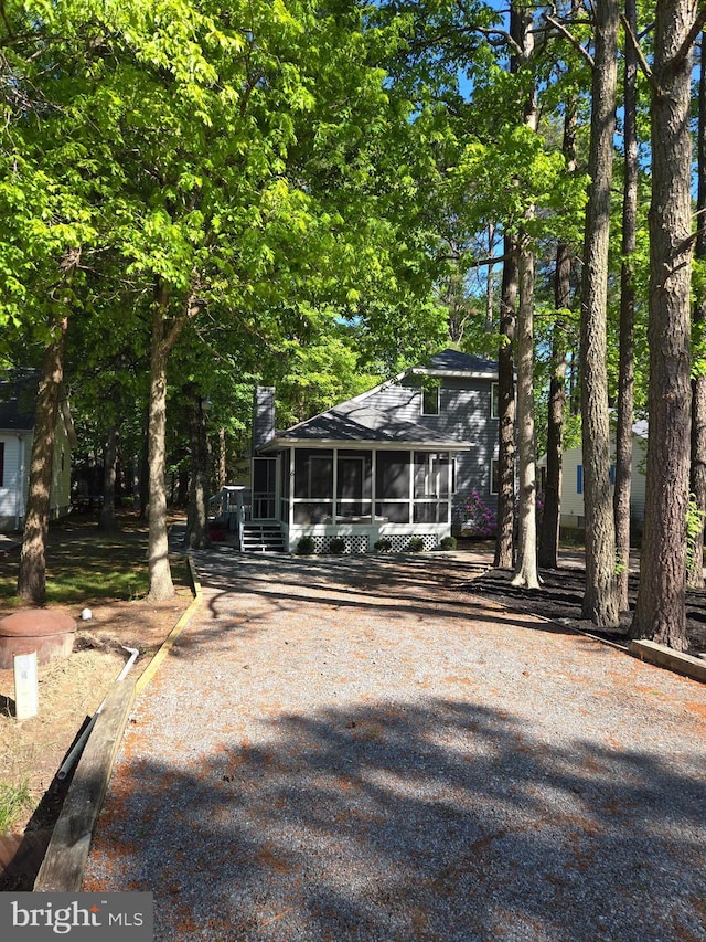 6 Granby Ln, Ocean Pines, MD 21811 - view of front facade with a sunroom and driveway