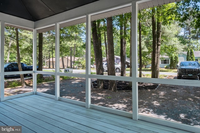 6 Granby Ln, Ocean Pines, MD 21811 - unfurnished sunroom with vaulted ceiling and plenty of natural light