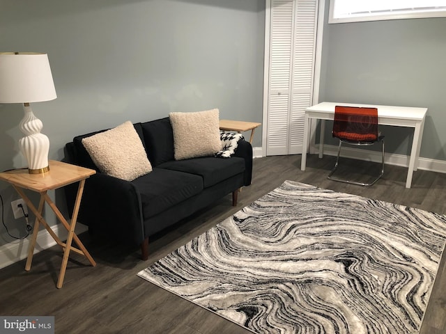 2300 Ashland Ave, Baltimore, MD 21205 - living room with wood finished floors and baseboards