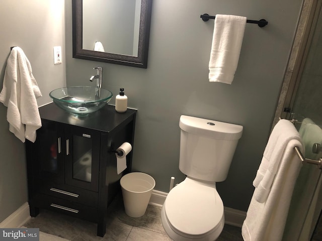 2300 Ashland Ave, Baltimore, MD 21205 - bathroom featuring vanity, toilet, and baseboards