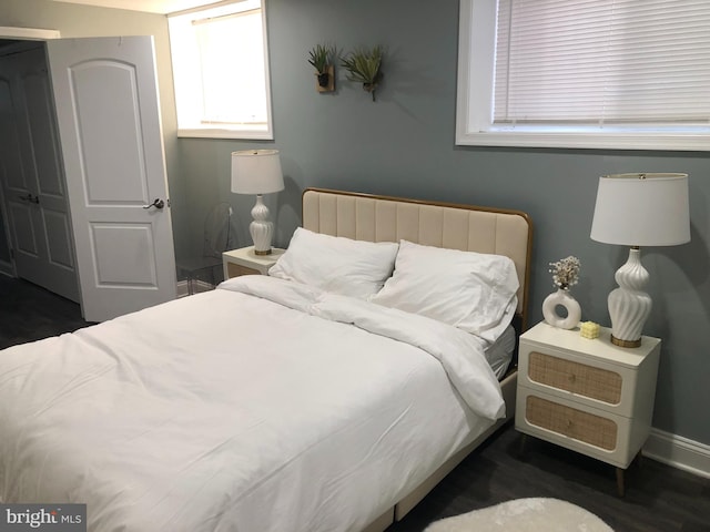2300 Ashland Ave, Baltimore, MD 21205 - bedroom featuring wood finished floors and baseboards