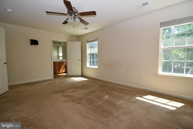 10020 Iron Pointe Dr Unit 9D, Millsboro, DE 19966 - unfurnished bedroom with multiple windows and carpet