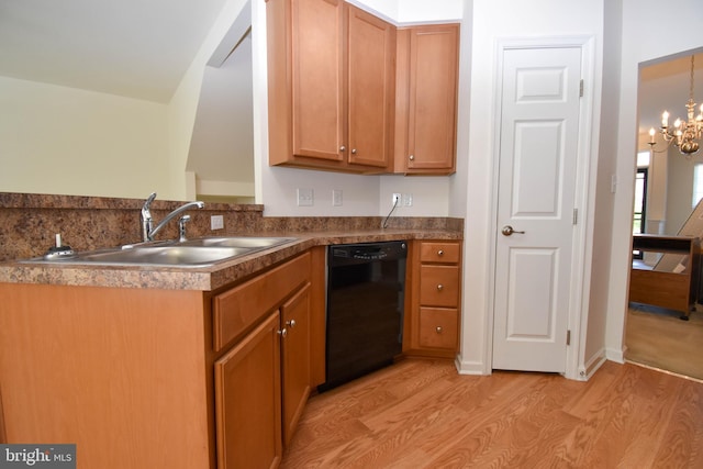 10020 Iron Pointe Dr Unit 9D, Millsboro, DE 19966 - kitchen with black dishwasher, a sink, light wood-style flooring, a chandelier, and brown cabinets