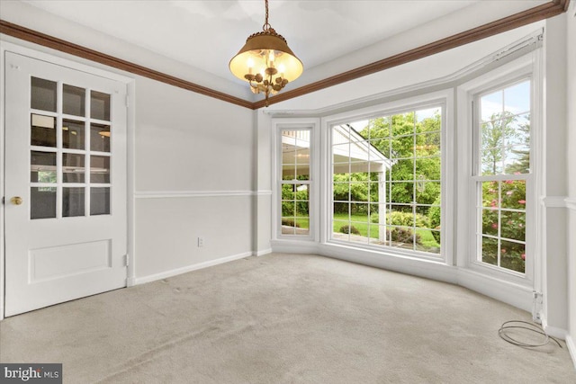 unfurnished dining area featuring carpet floors, healthy amount of natural light, and baseboards