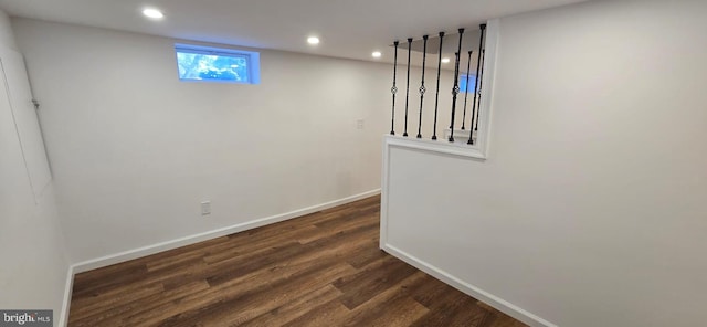 basement with dark wood-style flooring, recessed lighting, and baseboards