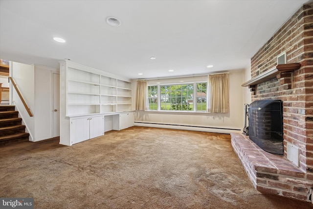 unfurnished living room featuring a baseboard radiator, carpet, stairway, a fireplace, and recessed lighting