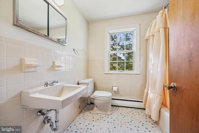 bathroom featuring baseboard heating, tile walls, toilet, tile patterned flooring, and shower / tub combo