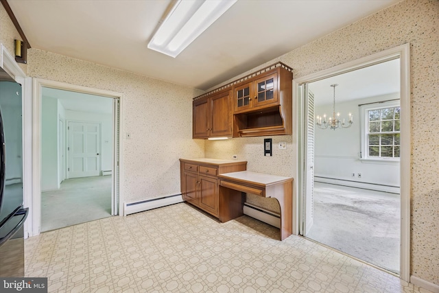 kitchen featuring a baseboard heating unit, a baseboard radiator, brown cabinets, a chandelier, and wallpapered walls