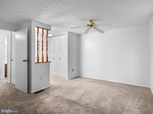 13833 Palmer House Way Unit 32-233, Silver Spring, MD 20904 - carpeted spare room with ceiling fan, baseboards, and a textured ceiling