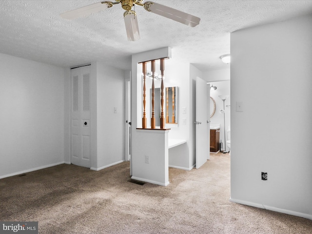 13833 Palmer House Way Unit 32-233, Silver Spring, MD 20904 - unfurnished bedroom with a textured ceiling, carpet, baseboards, a closet, and a ceiling fan
