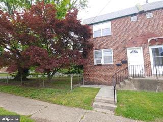 1113 Faunce St, Philadelphia, PA 19111 - view of front of house with brick siding and a front yard
