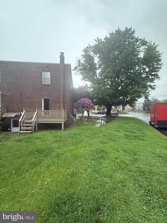 1113 Faunce St, Philadelphia, PA 19111 - view of grassy yard with a deck